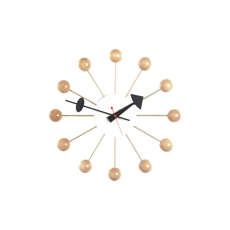 Vitra Ball Clock featuring natural beech spokes and quartz precision—modern icon by George Nelson.