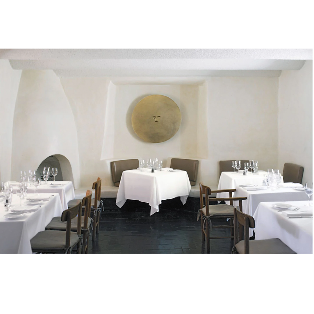 Designer wall relief combining modernist art with timeless symbolic design.