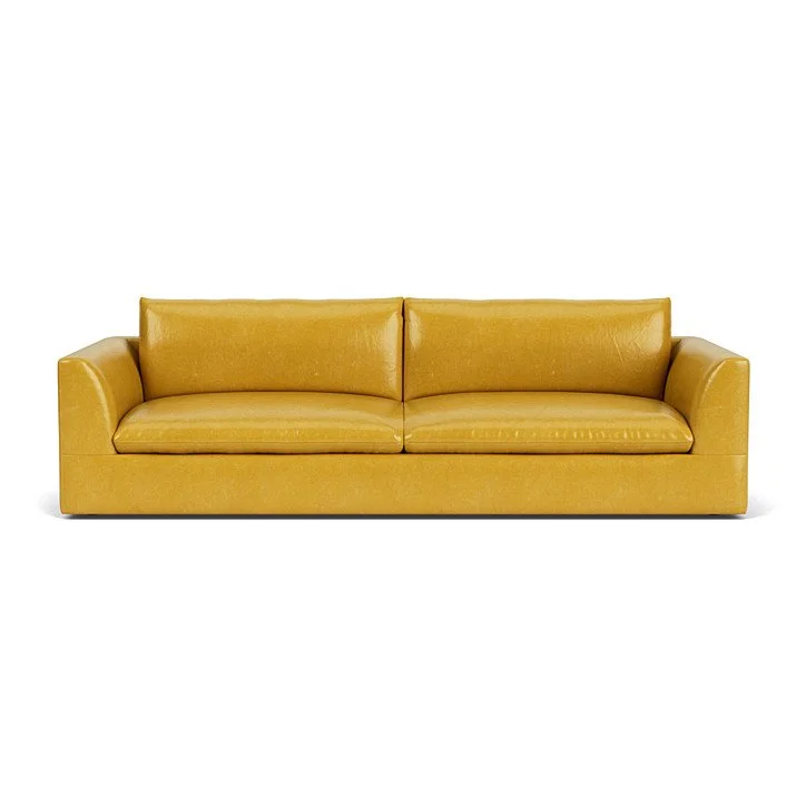 Deep seating sofa with loose cushions, refined stitching, and premium comfort materials.