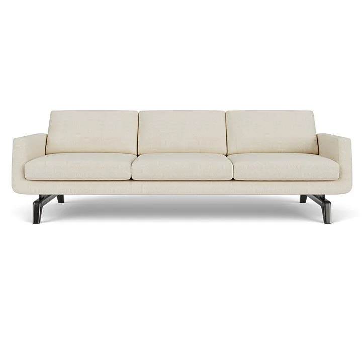 Nash Sofa by American Leather with mid-century lines, loose cushions, and solid wood legs in a warm contemporary living space.