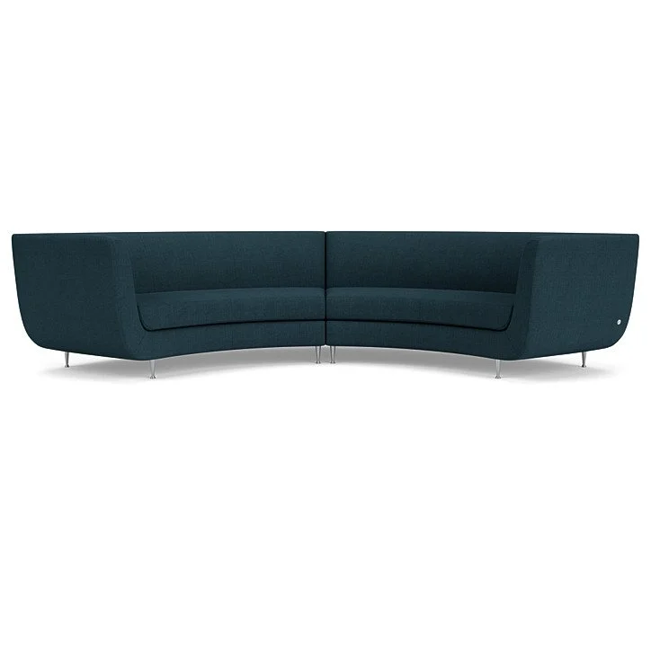 Contemporary sofa with sleek legs, refined stitching, and customizable finishes.