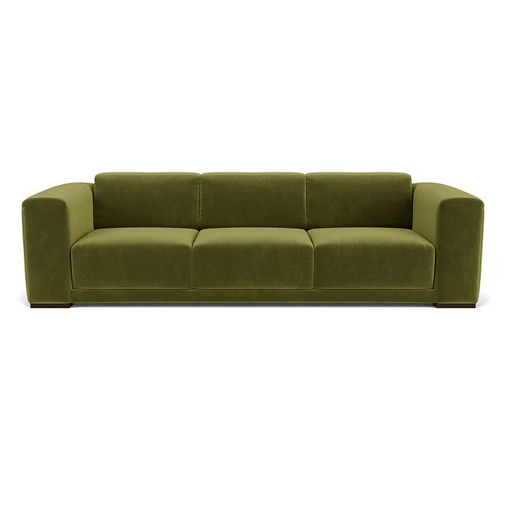 Sofa with plush cushions, refined stitching, and customizable leg options.