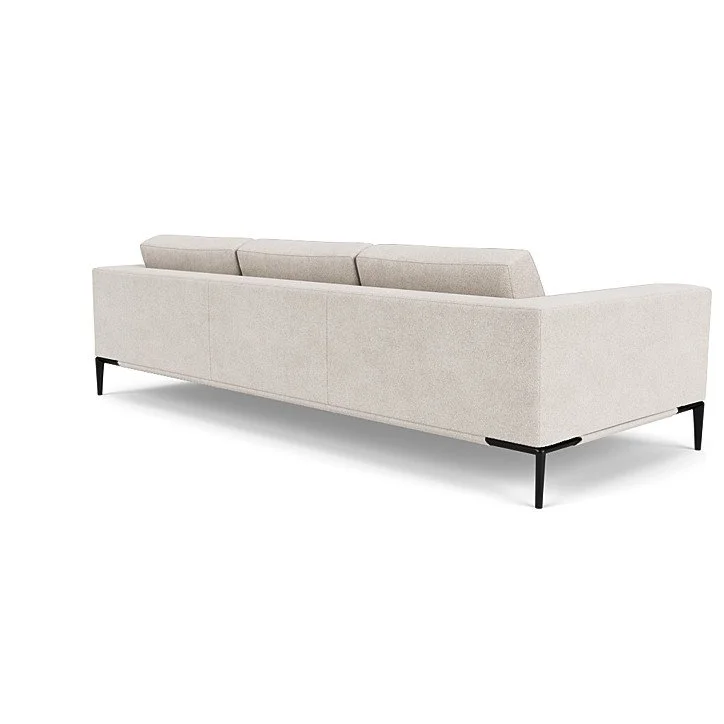 Copenhagen Sofa by American Leather with modern silhouette, loose cushions, and polished aluminum legs in a bright contemporary living room.