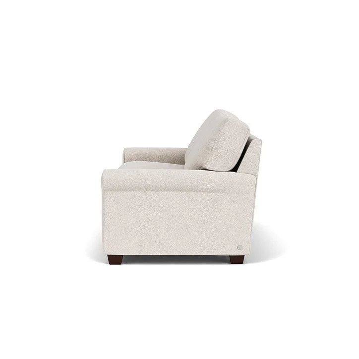 Savoy Sofa shown in leather with premium foam cushions and wood legs in Ebony finish.