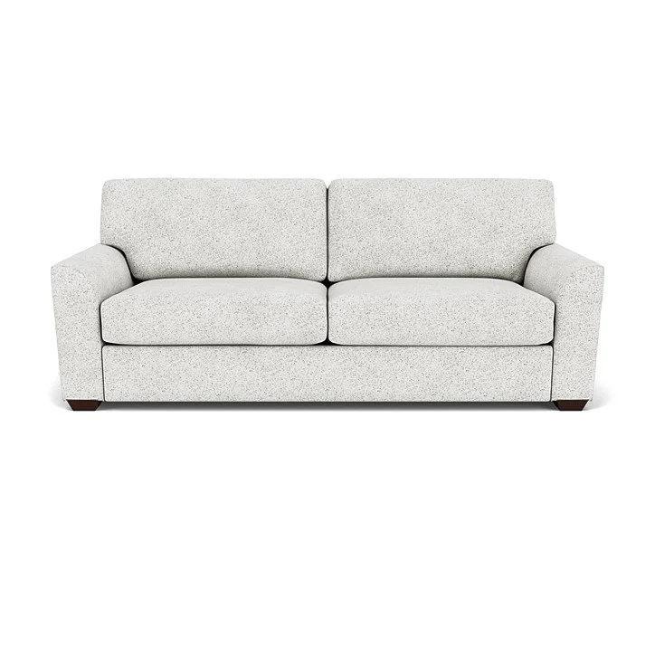 Elegant sofa with tailored stitching, relaxed cushions, and versatile customization options.