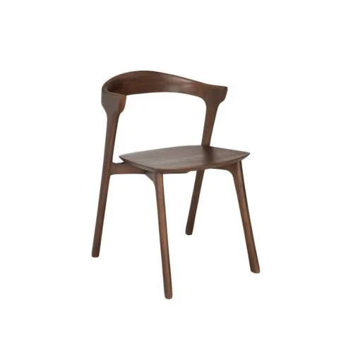 Modern dining space styled with Ethnicraft's Bok Dining Chairs in solid oak.