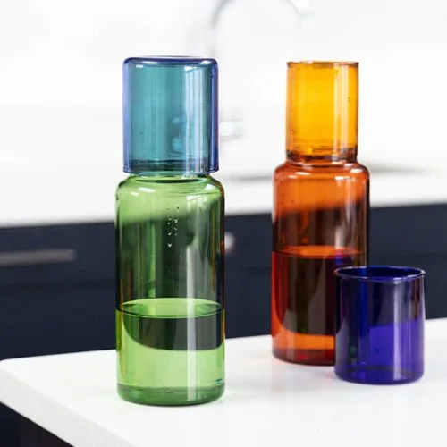 Contemporary glass carafe perfect for serving or sculptural display.