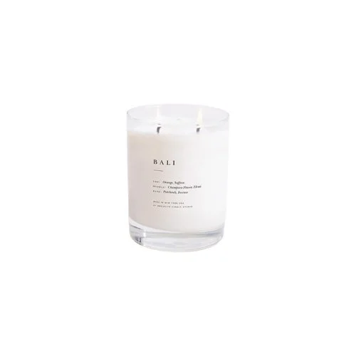 Hand-poured Bali candle with tropical notes of orange, saffron, and champaca flower.