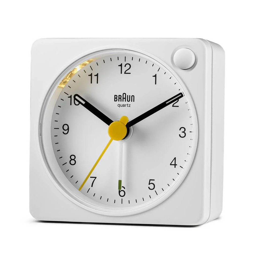 White bedside clock with luminous tips, snooze/light, and quiet quartz movement for clear legibility.