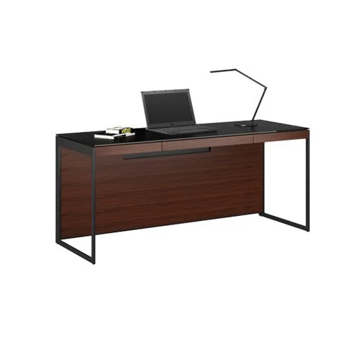 Sequel 20 6101 Desk by BDI in chocolate‑stained walnut with black glass top and black frame.
