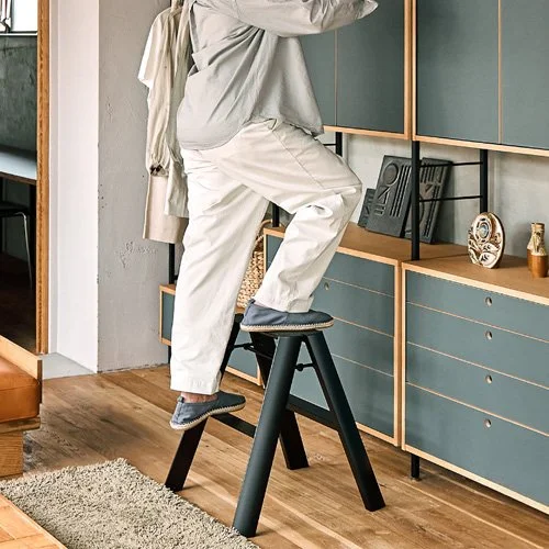 Sleek folding step stool designed in Japan for modern interiors.