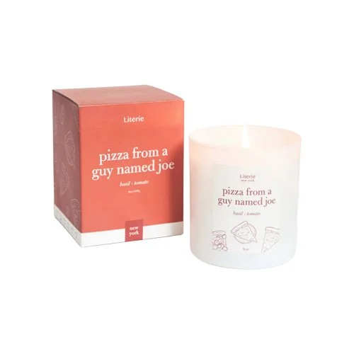 Hand-poured coconut-soy candle in a minimalist glass vessel, clean-burning and vegan.