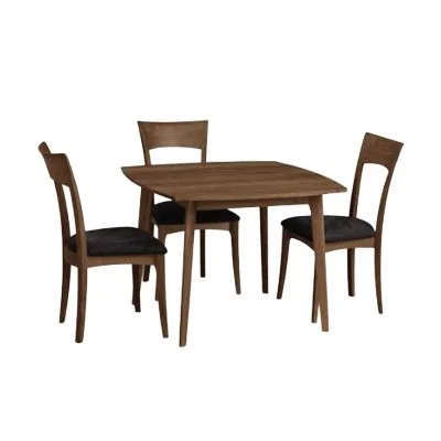 Mid-century inspired Copeland Catalina dining table in solid walnut with sculptural base and eco-friendly hardwood construction.