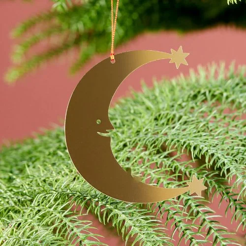 Designer brass ornament inspired by Girard’s 1965 playful graphic symbols.