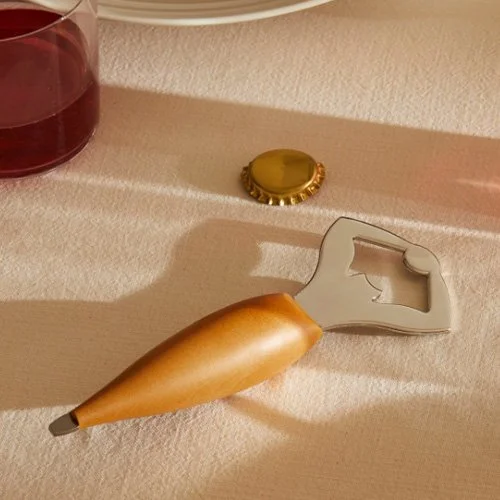 Alessi Ercolino Bottle Opener – ergonomic, artistic bar tool combining Italian design and everyday function.