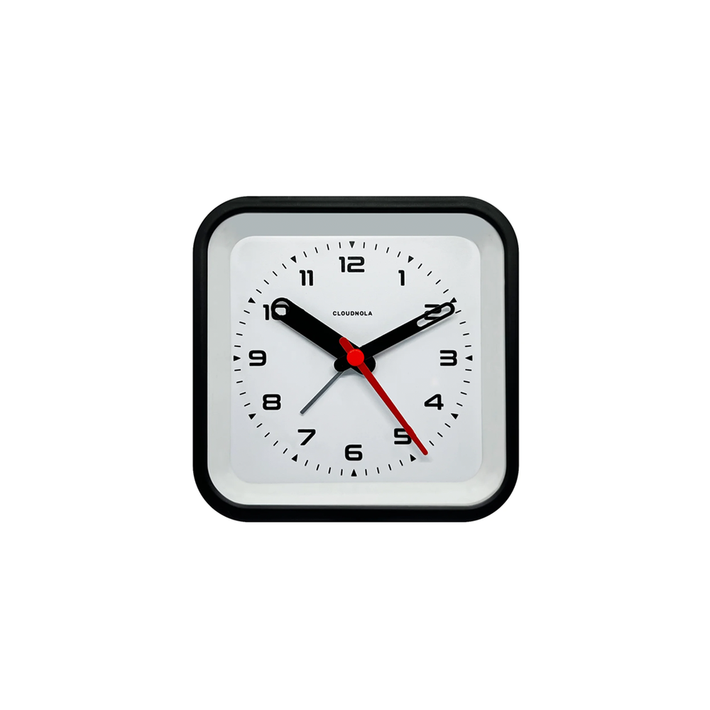 Matte black alarm clock with bold white face