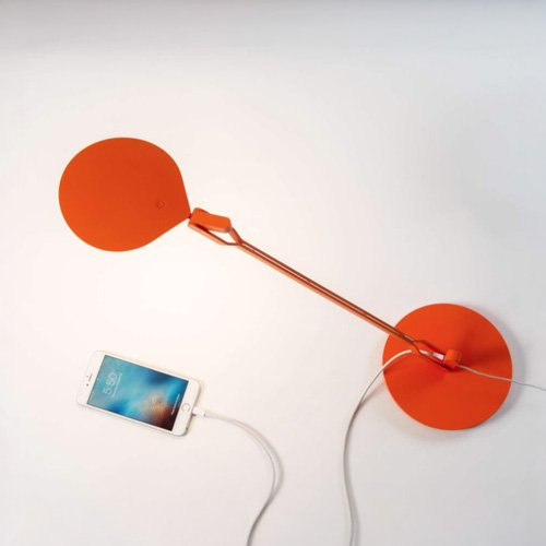 Minimalist workspace lamp with smooth articulation and efficient LED output.