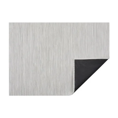 Durable Rib Weave Rug by Chilewich, fade- and stain-resistant, crafted for indoor/outdoor use.