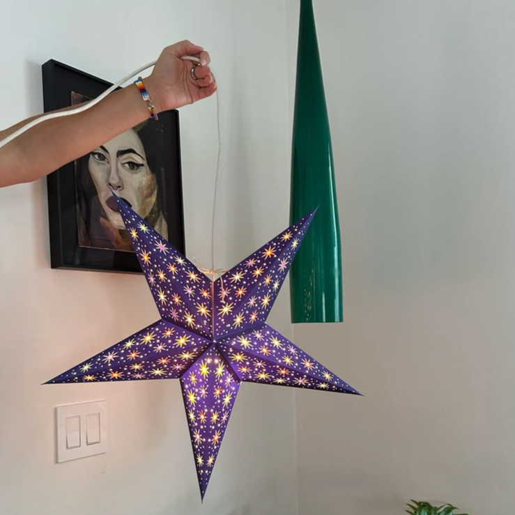 Artecnica Starlet Blue lantern showing compact star geometry and modern lighting design.