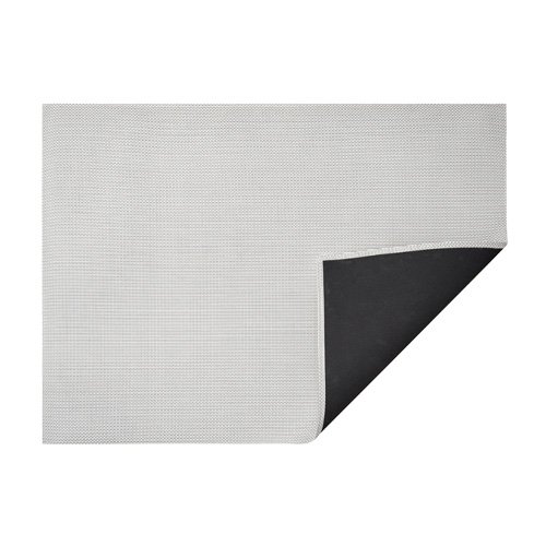 Sustainable Basketweave Rug by Chilewich, fade- and stain-resistant, ideal for indoor/outdoor spaces.