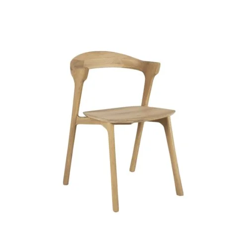 Bok Dining Chair by Ethnicraft with sculptural silhouette and solid oak frame.