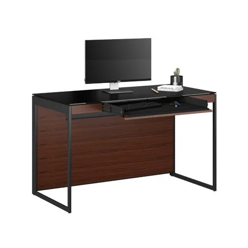 Sequel 20 6103 Compact Desk in chocolate-stained walnut with black glass surface.