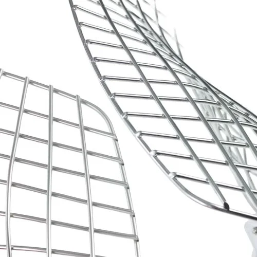 Sculptural wire-frame lounge chair with Hourglass cushion and modern form.