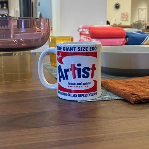 Lifestyle shot: the graphic ego mug in any creative space.