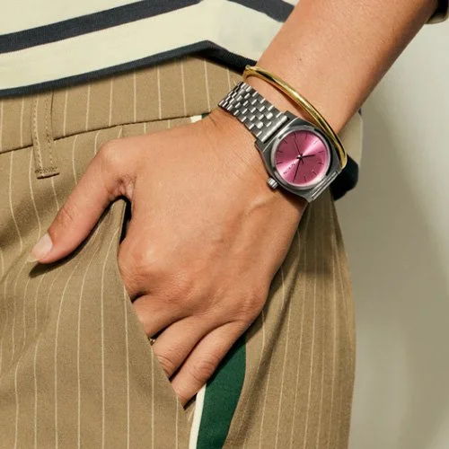 Nixon Medium Time Teller watch in silver and pink with stainless steel bracelet