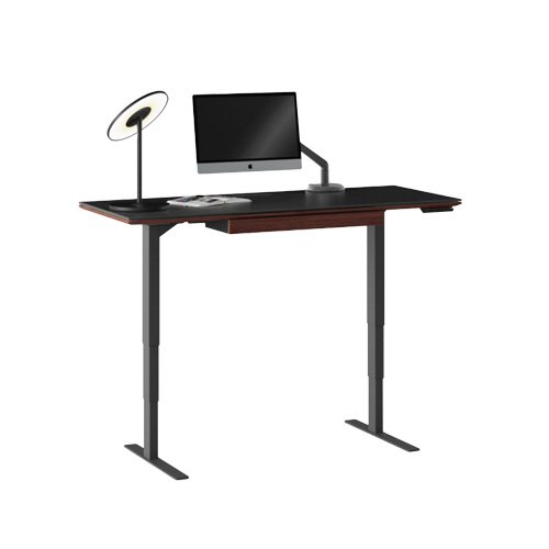 Executive sit-to-stand desks by BDI featuring programmable settings and refined finishes.
