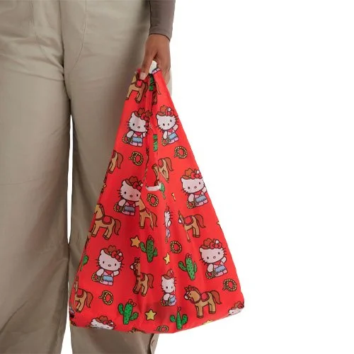Foldable recycled nylon shopping bag combining playful print and durable design.