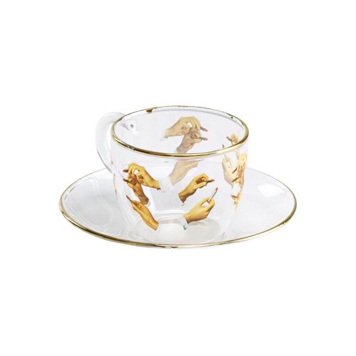 Borosilicate glass coffee cup and saucer with lipstick graphic and gold detail