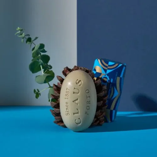 Handcrafted Claus Porto soap enriched with shea oil in blue-and-gold Art Deco packaging.