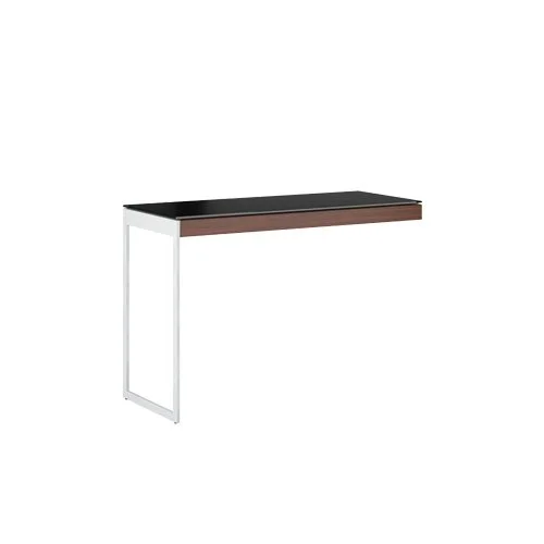 Sequel 20 6112 Desk Return by BDI in chocolate-stained walnut with black glass surface.