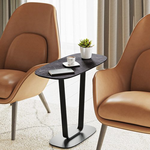 Modern black side table with powder-coated steel frame and stone-look surface.