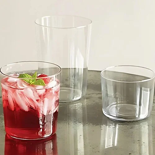 Canvas Home Spanish Tall Beer Glass handcrafted from recycled glass with subtle bubbles.