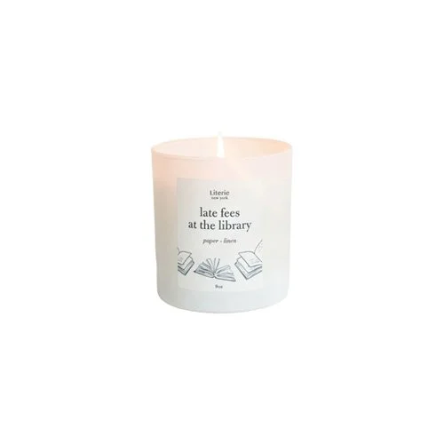 Literie Late Fees at the Library candle with notes of cedar, leather, and vanilla.
