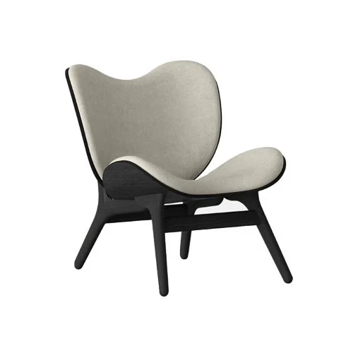 A Conversation Piece Lounge Chair in black oak with multiple upholstery options by Umage.