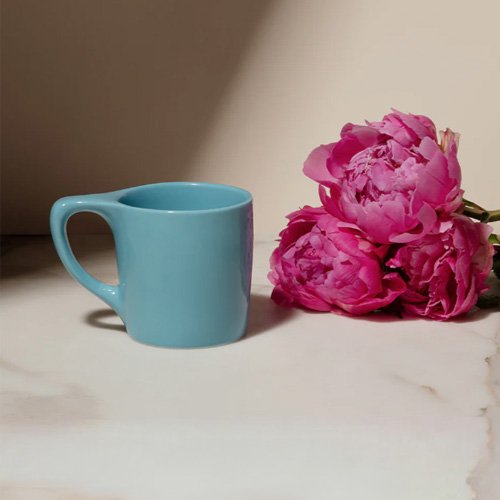 Modern blue mug by NotNeutral — stackable, dishwasher-safe, and made for café performance.