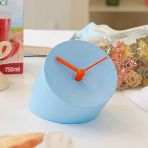 Sky Blue Mosery clock by Park Sung-ho and Lee Seong-yong with orange hands.