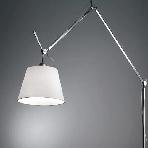 Technical floor lamp offering balanced mechanics and dimmable LED-T compatibility.