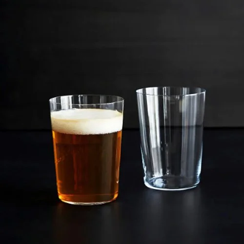 Eco-friendly short beer glass blending artisan craftsmanship with everyday elegance.