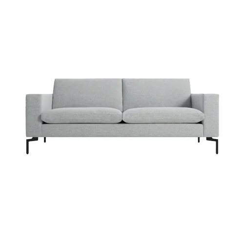 Modern sofa by Blu Dot featuring tailored upholstery and minimalist form