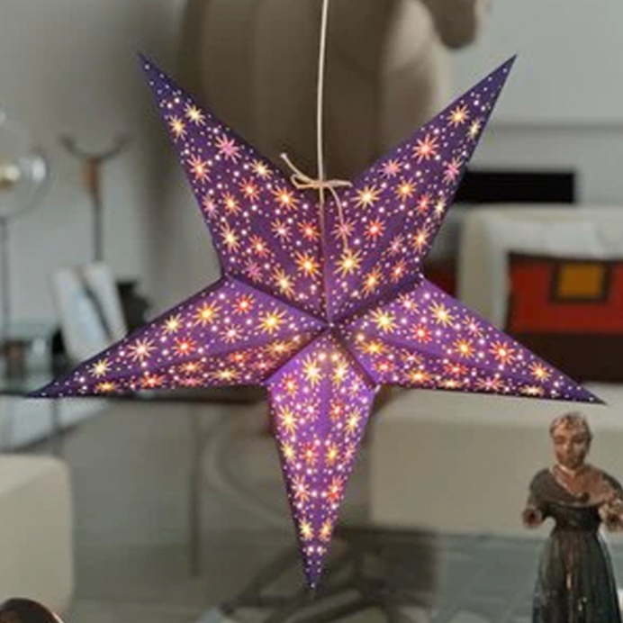 Contemporary pendant lighting accent featuring a handcrafted blue paper star lantern.
