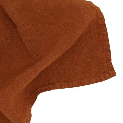 100% European linen napkin with stonewashed finish and rich terracotta hue.