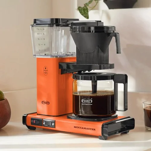 Orange Moccamaster KBGV Select with half or full carafe selector switch.