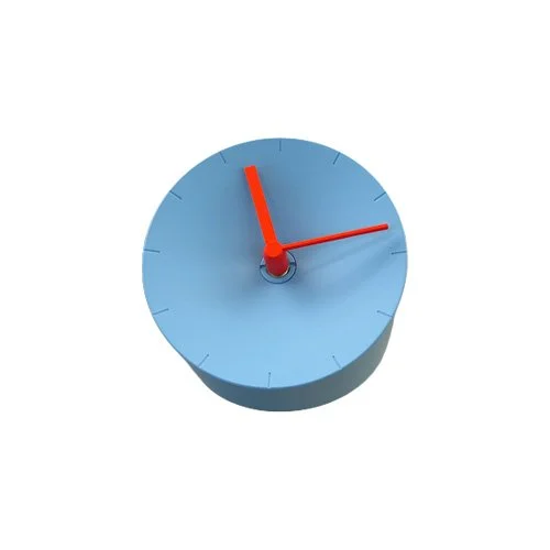 Mosery Corner Clock in Sky Blue with Orange Hands for compact spaces.