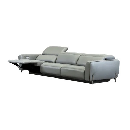 Turin Motion Sofa with knife-edge tailoring, clean track arms, and sculptural metal legs in a refined modern living room