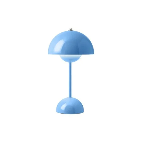 Swim blue portable lamp offering soft LED illumination and playful modern form.