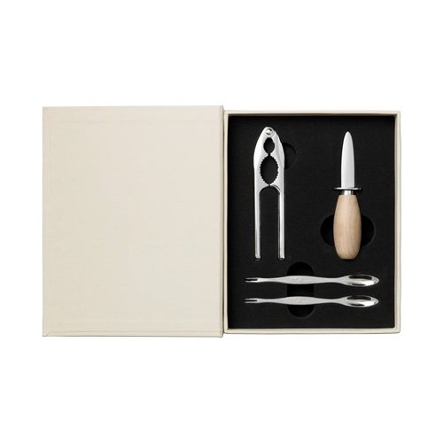 Organized seafood accessory kit for shellfish service with refined proportions